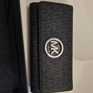 Michael Kors Black Textured Wallet with Silver Emblem